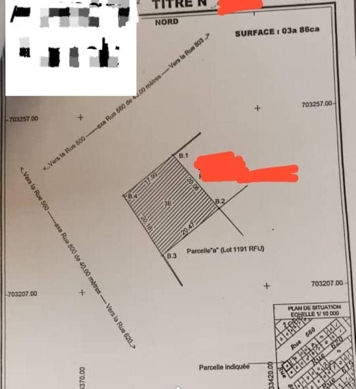 A vendre au carrefour Cadjehoun Cotonou a cote de la mosquee un immeuble R3 dune superficie de 368m² dote dun Titre Foncier