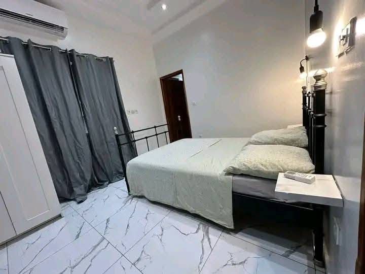 Appartement de luxe avec piscine et vue mer à Fidjrossè 11