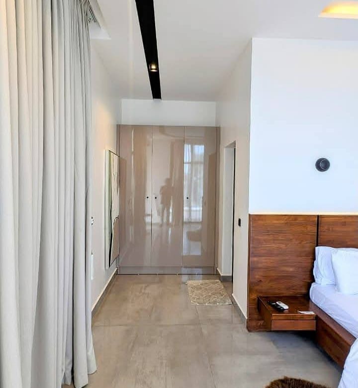 Villa d'exception avec piscine et vue mer à Fidjrossè 19