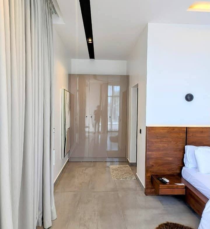 Villa d'exception avec piscine et vue mer à Fidjrossè 19